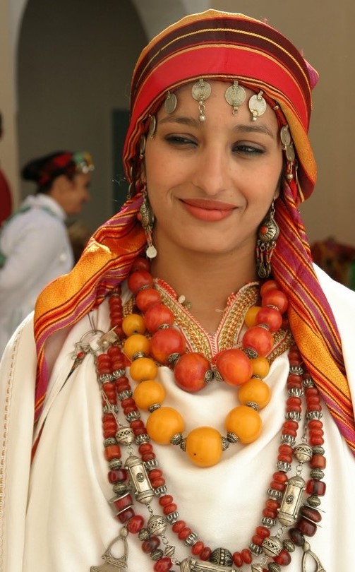 Berber woman in traditional dress and amber jewellery, Morocco
